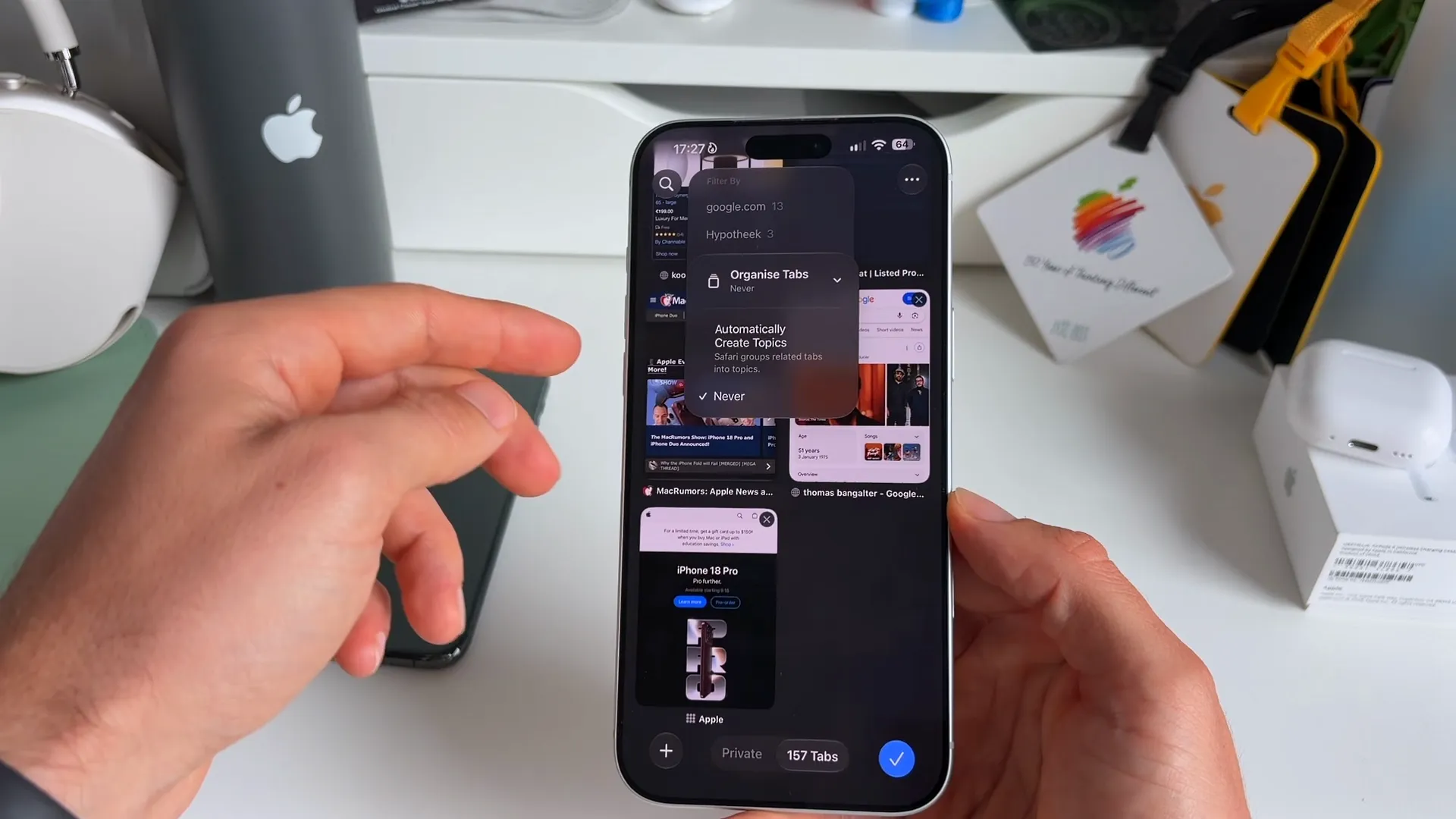 Safari tabs screen showing the filter menu with the Automatically Create Topics option selected
