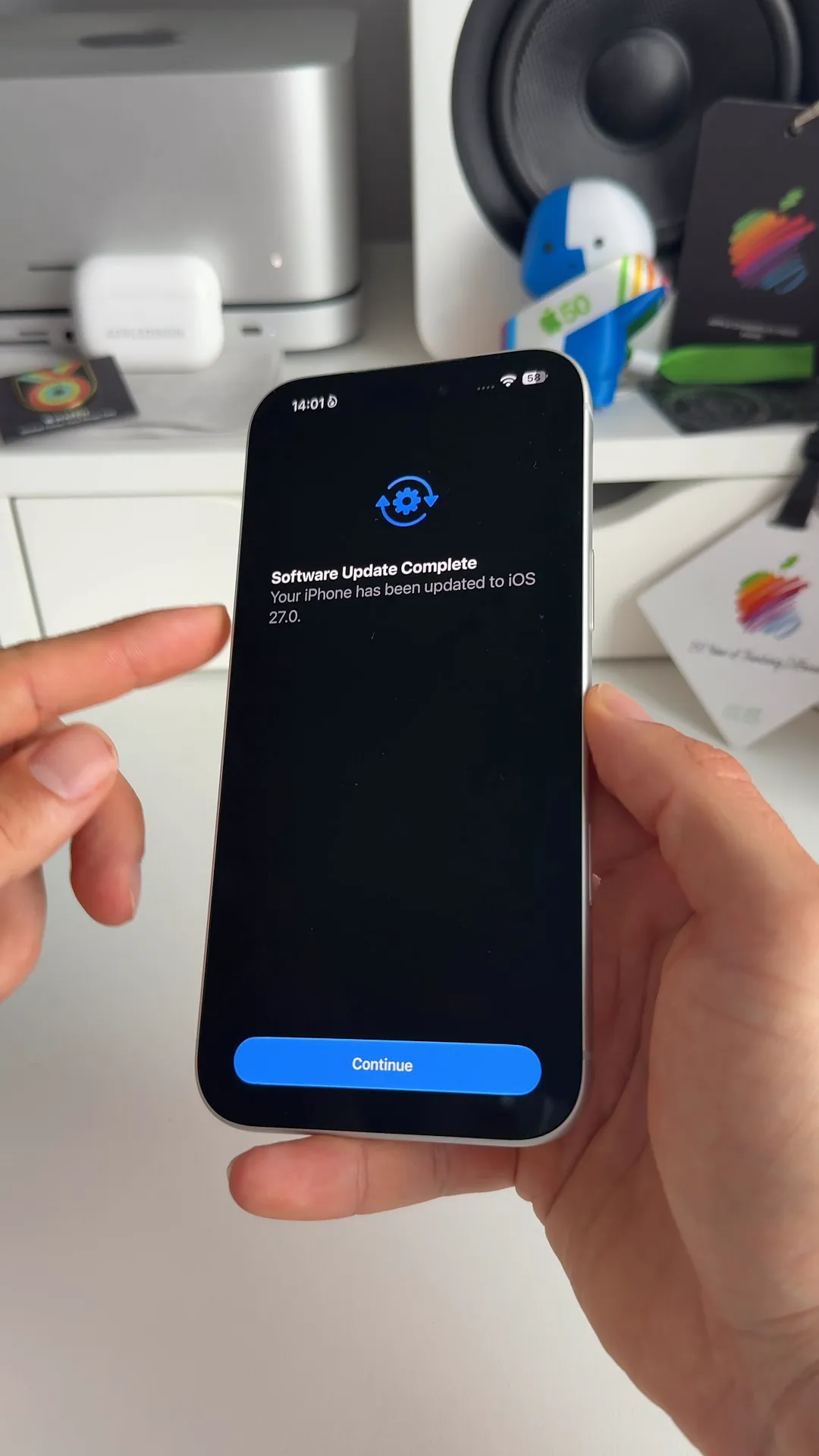 Software update complete screen showing the device has been updated to iOS 27.0