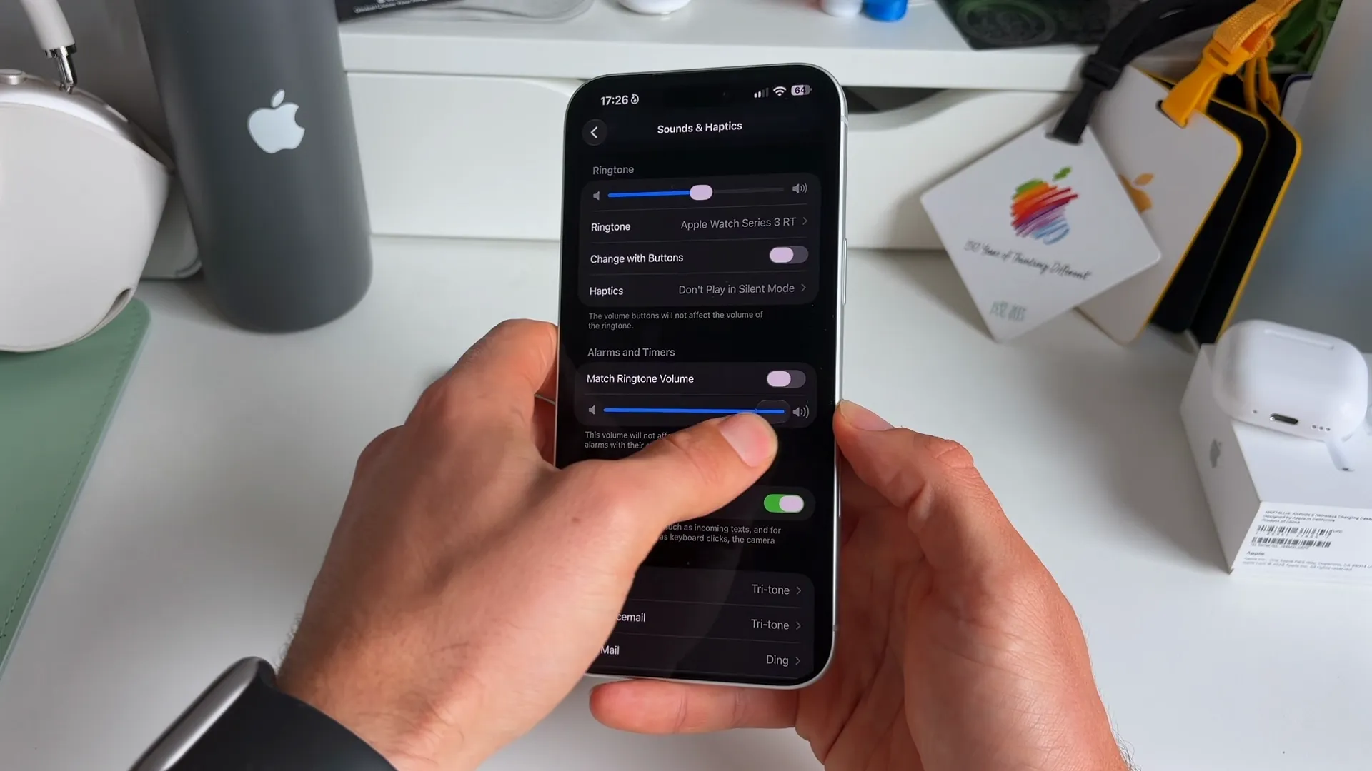 Sounds and Haptics settings screen with Match Ringtone Volume toggled off and the alarm volume slider adjusted